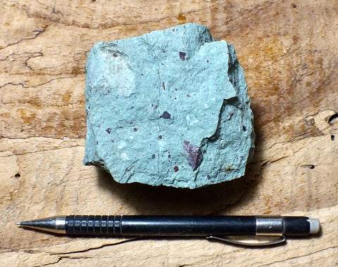 tuff - copper-stained green welded tuff - teaching hand/display specimen