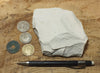 magnesite - hand specimen of light tan porous magnesite - Windous magnesite deposit, Westvaco Mine
