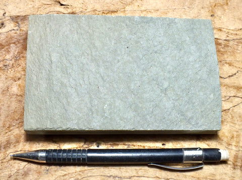 shale - hard green Lower Cambrian shale from the Harkless Formation - teaching hand specimen