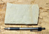 shale  -  teaching hand specimen of a Jurassic tan limey shale from the Carmel Formation of Utah