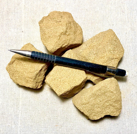 sandstone - yellow-brown medium-grained non-marine Miocene sandstone - Unit of 5 student specimens