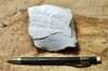 tuff - very pure lithified white volcanic ash mined for Old Dutch Cleanser - teaching hand specimen