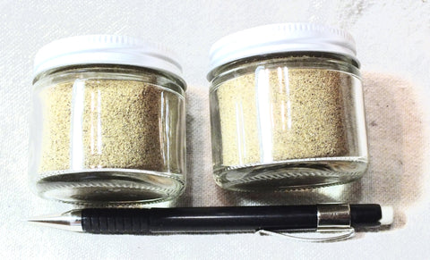 sand - dune sand - fine-grained yellow-brown dune sand derived from a sandstone member of the Menefee Formation in New Mexico - set of two 2-ounce jars