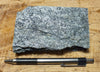 schist -  teaching hand specimen of fine-grained gray mica schist