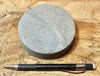 sandstone - medium grained gray - 4" diameter oil well core slice from the Stevens Sand - hand specimen