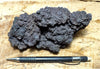 basalt - tholeiite basalt aa from the flow that cut Mauna Loa Road in November 2022 - hand/display specimen