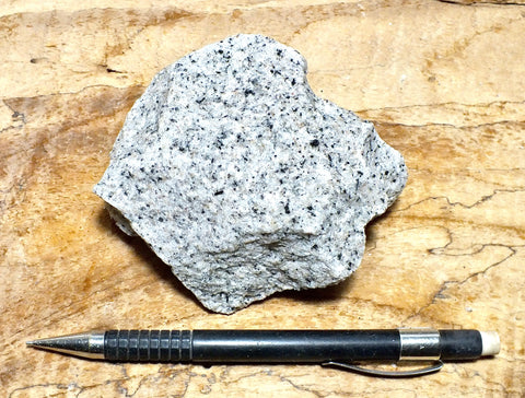 aplite - hand specimen of aplite from an aplite-pegmatite dike that intruded anorthosite