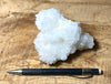 aragonite - "cave calcite"  - El Potosi Mine, Santa Eulalia Mining District, Chihuahua - fluorescent hand/display specimen