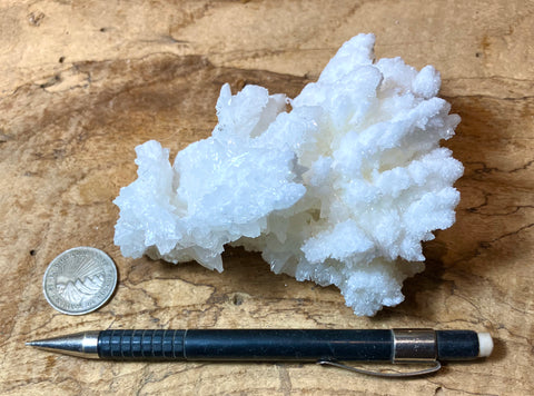 aragonite - "cave calcite"  - El Potosi Mine, Santa Eulalia Mining District, Chihuahua - fluorescent hand/display specimen