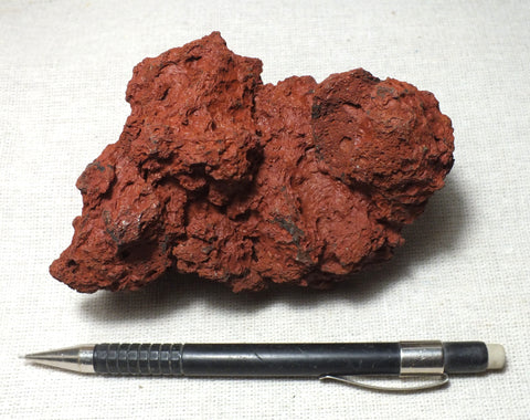scoria - teaching hand/display specimen of maroon scoriaceous basalt ejecta from a cinder cone on Mauna Loa