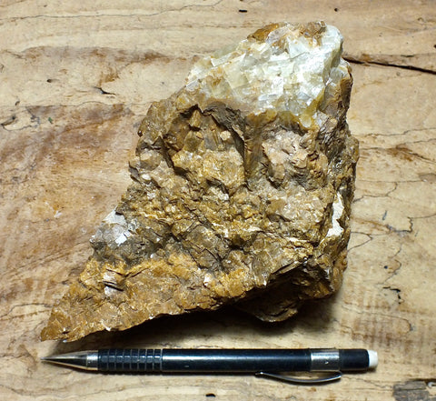 calcite - teaching display specimen of massive naturally-brown calcite
