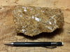 calcite - teaching hand specimen of naturally-brown calcite