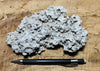 caliche - caliche formed in uplifted Pleistocene lake beds, uncovered and partly dissolved by acidic rain - hand/display specimen