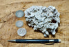 caliche - caliche formed in uplifted Pleistocene lake beds, uncovered and partly dissolved by acidic rain - hand/display specimen