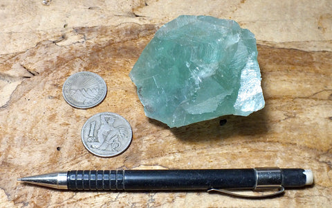 fluorite - teaching hand specimen of a mineral often associated with metallic ores - massive fluorite