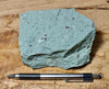 tuff - copper-stained green welded tuff - teaching hand/display specimen