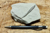 limestone - tan silty limestone from the Jurassic Carmel Fm. - teaching hand specimen