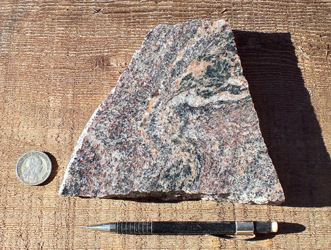 migmatite - a gneiss that has undergone partial melting, from a quarry in India - hand specimen