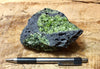 peridotite xenolith in vesicular phonotephrite from the San Carlos Volcanic Field, Arizona - teaching hand/display specimen