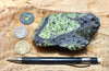 peridotite xenolith in vesicular phonotephrite from the San Carlos Volcanic Field, Arizona - teaching hand specimen