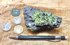 peridotite xenolith in vesicular phonotephrite from the San Carlos Volcanic Field, Arizona - teaching hand specimen