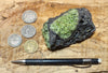 peridotite xenolith in vesicular phonotephrite from the San Carlos Volcanic Field, Arizona - teaching hand specimen