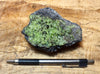 peridotite xenolith in vesicular phonotephrite from the San Carlos Volcanic Field, Arizona - teaching hand specimen