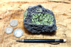 peridotite xenolith in vesicular phonotephrite from the San Carlos Volcanic Field, Arizona - teaching hand/display specimen