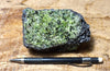 peridotite xenolith in vesicular phonotephrite from the San Carlos Volcanic Field, Arizona - hand/display specimen