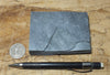 phyllite - hand specimen of a silvery to dark gray Paleozoic phyllite from the Shoo Fly Complex