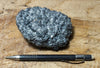 pumice - teaching hand specimen of glassy gray pumice - Geological Specimen Supply
