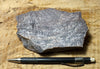 quartzite - maroon and gray banded teaching hand specimen of Lower Cambrian quartzite