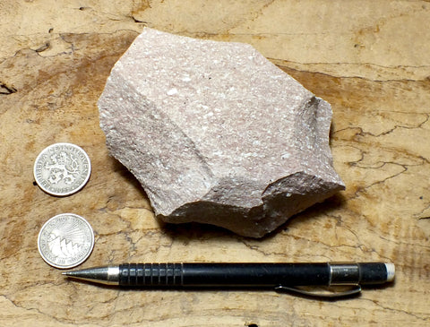 rhyolite porphyry - light pink rhyolite with small phenocrysts - hand/display specimen