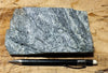 schist -  teaching hand specimen of fine-grained gray mica schist