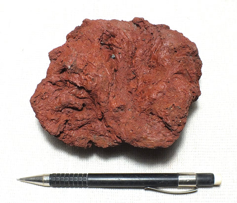 scoria - teaching hand/display specimen of maroon/red scoriaceous basalt from Mauna Loa volcano