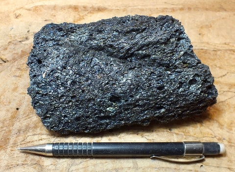 tachylite - glassy tachylite crust on vesicular basalt from the surface of the 2018 Kilauea flow that destroyed Kapoho, Hawaii - hand/display specimen
