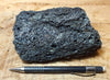 tachylite - glassy tachylite crust on vesicular basalt from the surface of the 2018 Kilauea flow that destroyed Kapoho, Hawaii - hand/display specimen