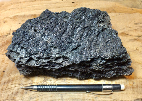 tachylite - tachylite crust over vesicular basalt from the surface of the 2018 Kilauea flow that destroyed Kapoho, Hawaii - large hand/display specimen