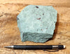 tuff - copper-stained green welded tuff - teaching hand specimen