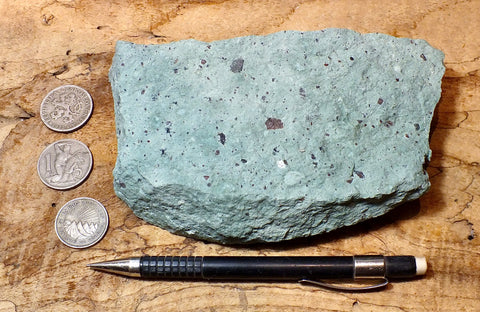 tuff - copper-stained green welded tuff - teaching hand/display specimen