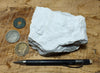 tuff - very pure lithified white volcanic ash mined for Old Dutch Cleanser - teaching hand specimen