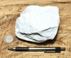 tuff - very pure lithified white volcanic ash mined for Old Dutch Cleanser - teaching hand specimen