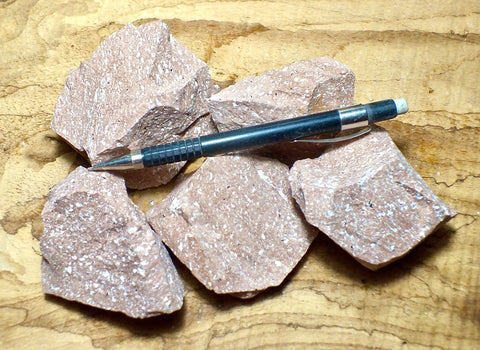 rhyolite porphyry - pinkish tan porphyritic rhyolite - Unit of 5 student specimens