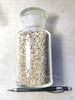 sand - large-grained quartz dune sand from Monastery Beach, Carmel Bay, California in a 250 ml display bottle with ground glass stopper