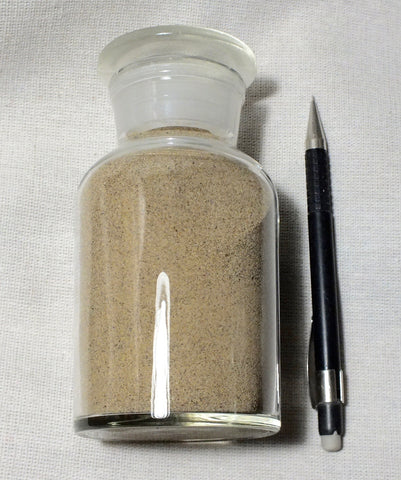 sand - dune sand - fine-grained yellow-brown dune sand derived from a sandstone member of the Menefee Formation in New Mexico - 250 ml display bottle with ground-glass stopper 