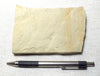 shale  -  teaching hand specimen of a Jurassic tan limey shale from the Carmel Formation of Utah 